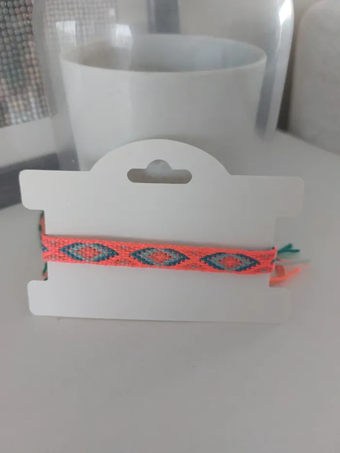 Bracelet tissé orange fluo