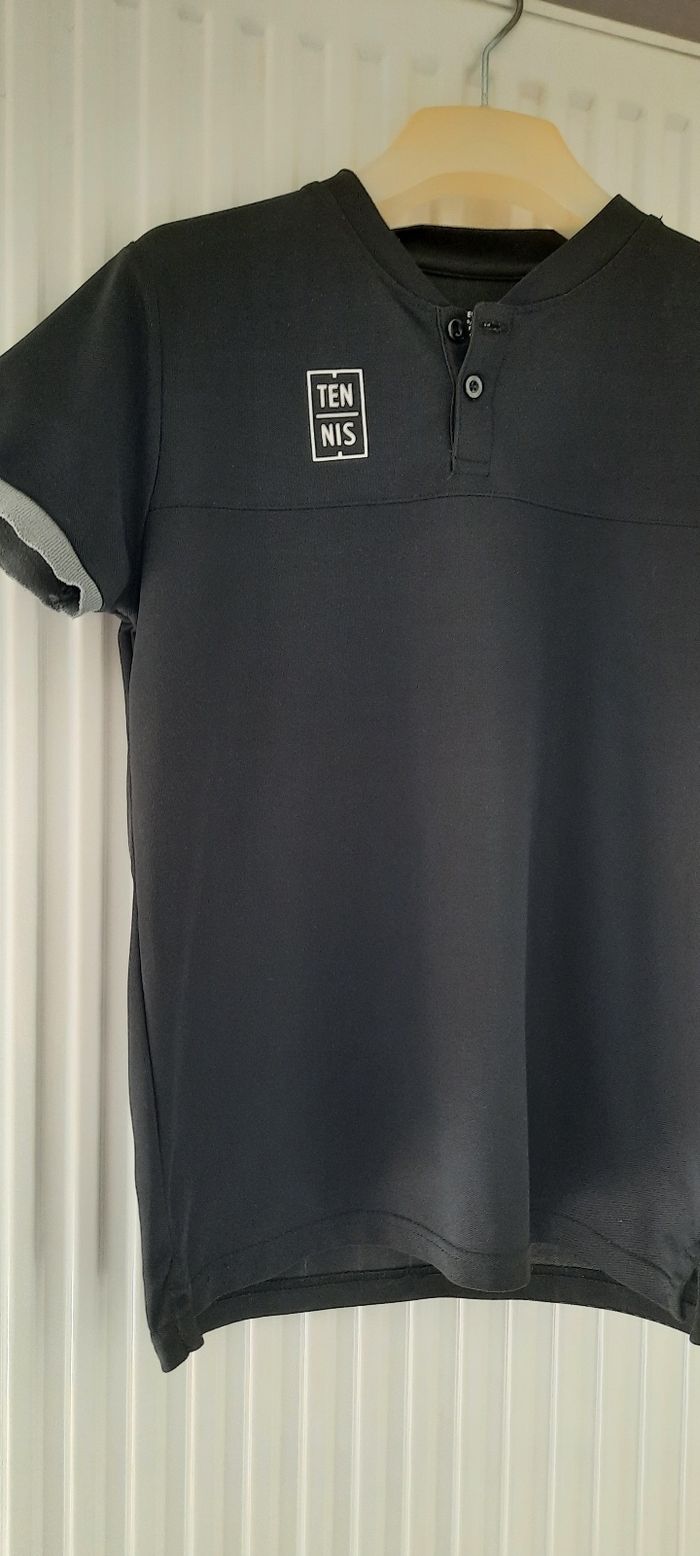Polo de tennis noir