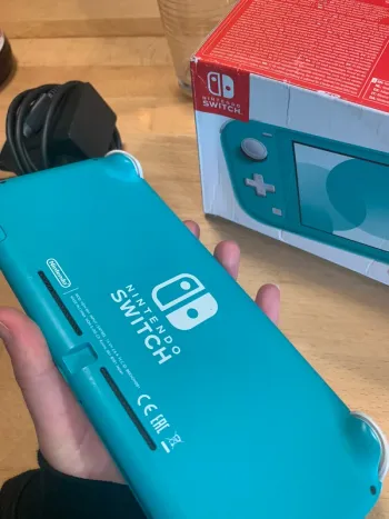 Nintendo switch lite bleu turquoise officielle avec boite