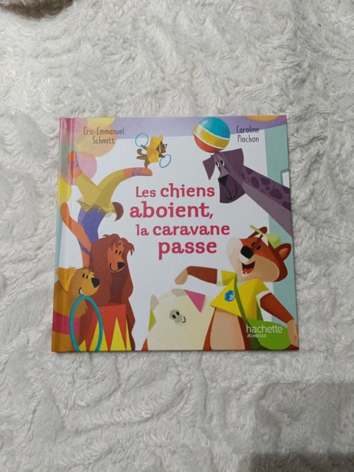 Livre Mac Do Les chiens aboient , la caravane passe Il était un dicton