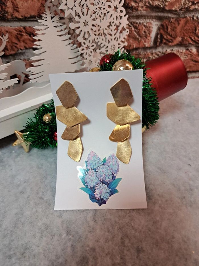 Boucles d'oreilles pendante doré