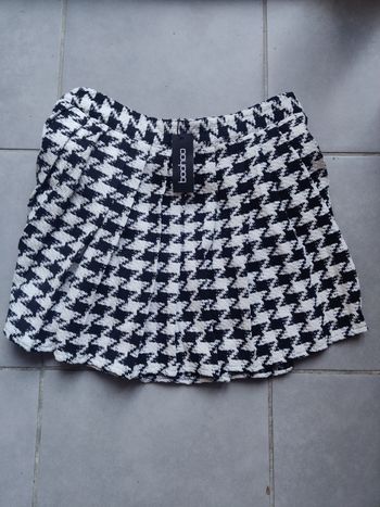 Jupe courte plissée pied-de-poule 