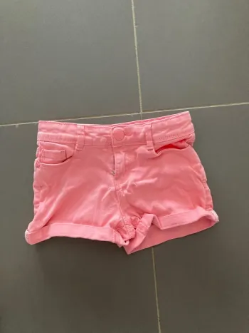 Short rose 6 ans en très bon état okaidi