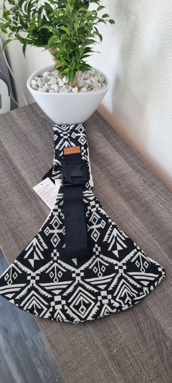 Très jolie porte bébé neuf!