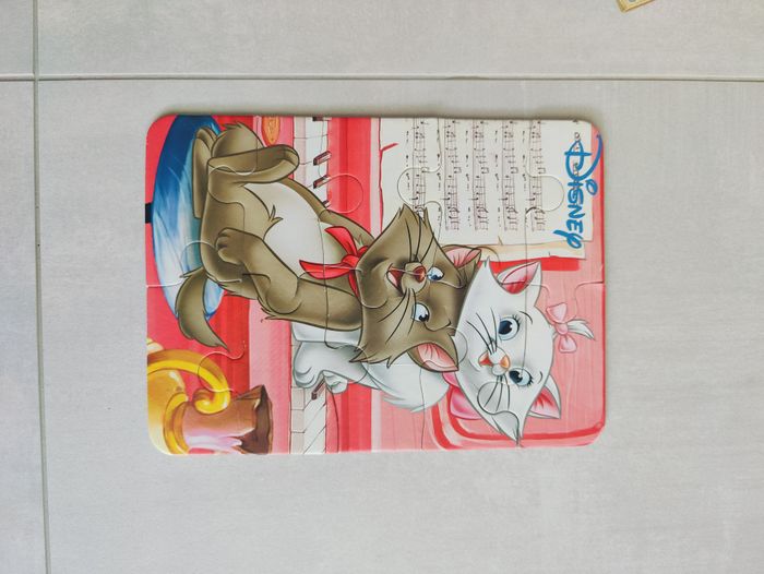 lot de 2 puzzles "Les aristochats" et animaux de la savane