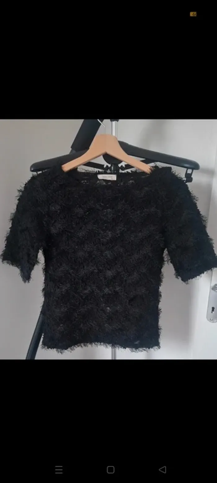 Pull duveteux, à poils noirs, semi ajouré "Naf Naf"