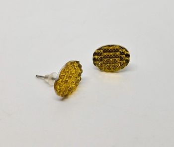 Paire de boucles d'oreilles.
Neuve.
Ovale jaune