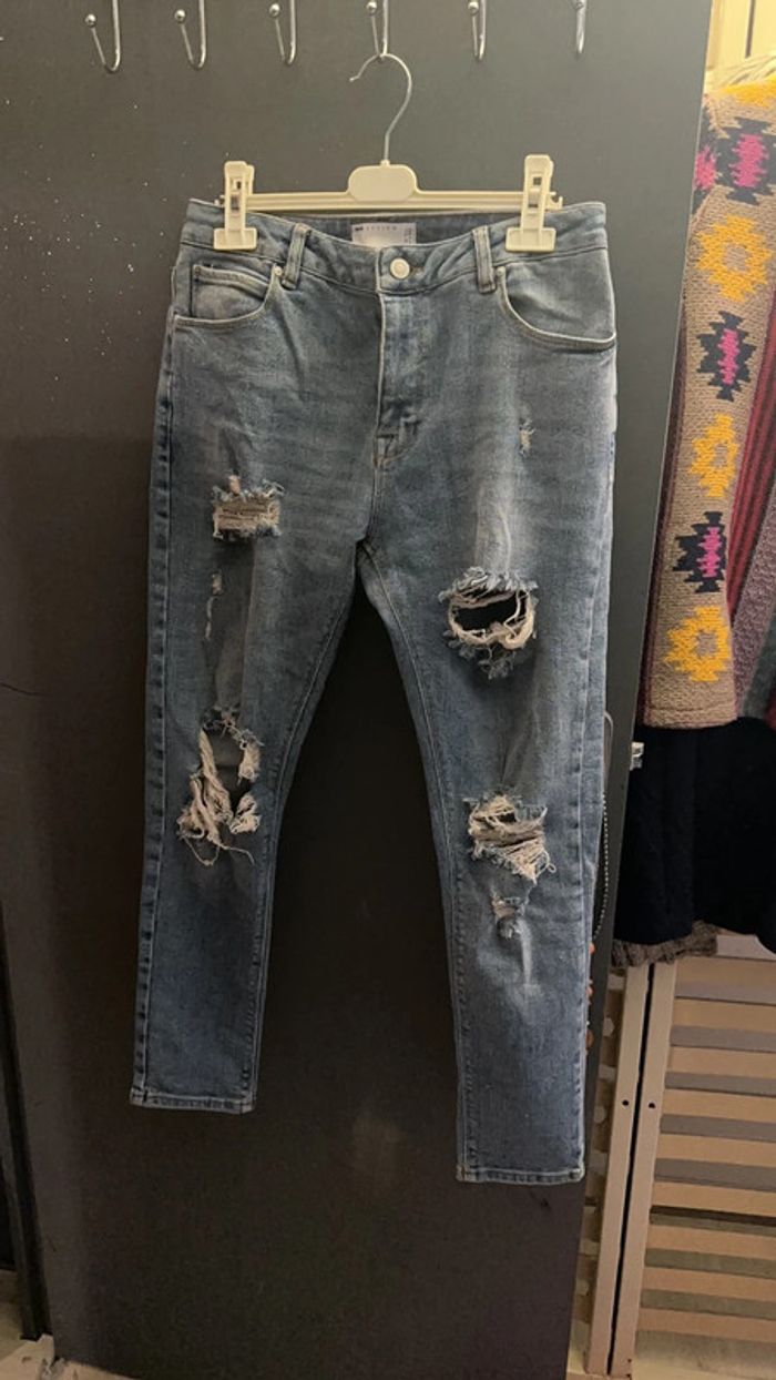 Extensible superbe jea troué skinny