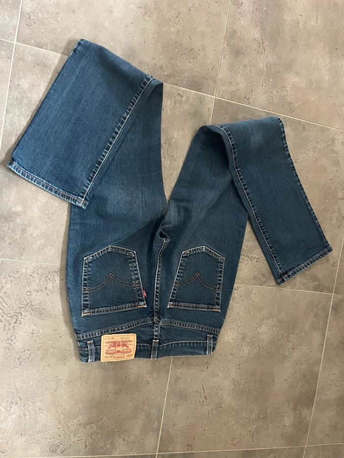 Jeans Lévis bleu brut 595 taille 28x34 - photo numéro 4
