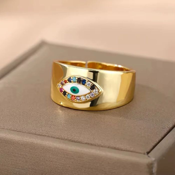 Bague œil dorée ajustable – acier inoxydable (neuve)