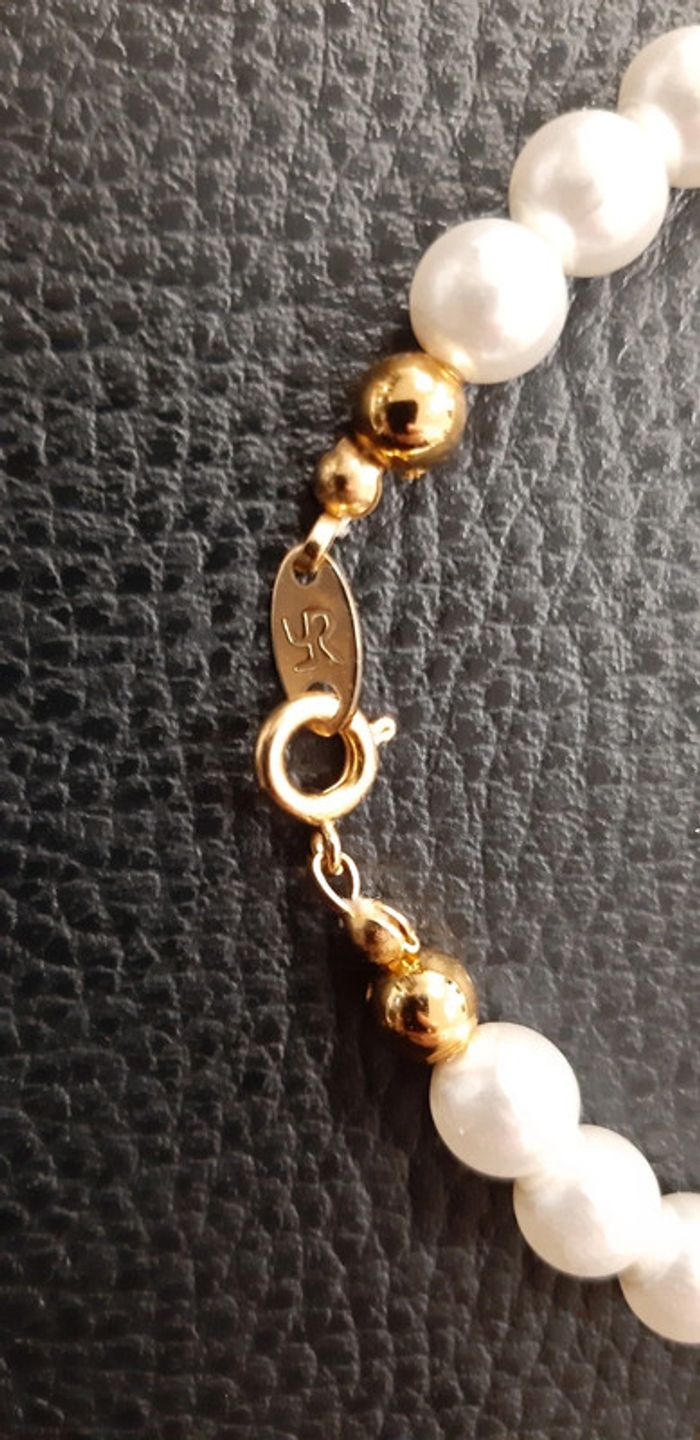 Joli bracelet en perles blanches et dorées Yves Rocher - photo numéro 3