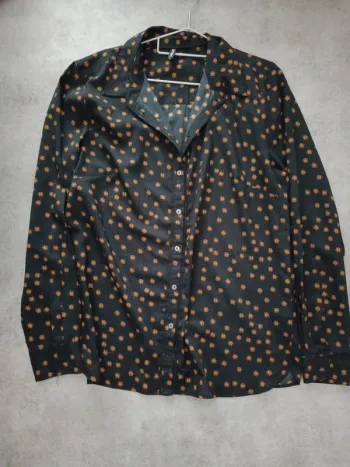 Chemise manches longues noir et oeil orange Desires M