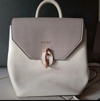 Sac à  dos dalery crème et gris en excellent état