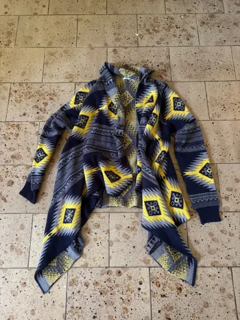 Gilet a pans long motif astek