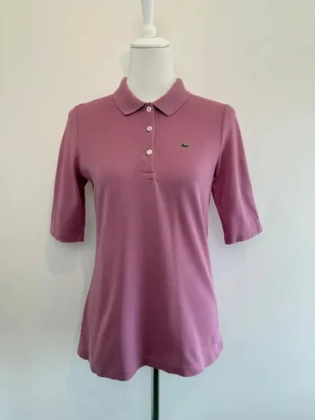 Polo Lacoste femme rose taille 40 soit M  super état