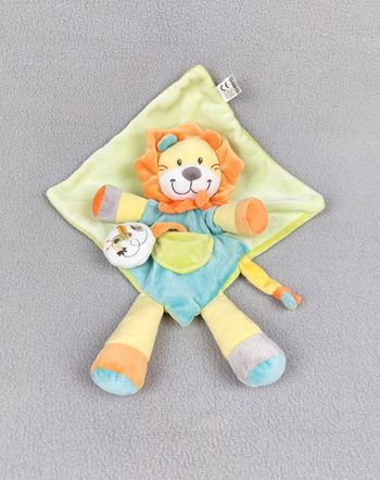 Doudou plat lion jaune vert bleu orange NICOTOY blanc écharpe oiseau toucan état neuf