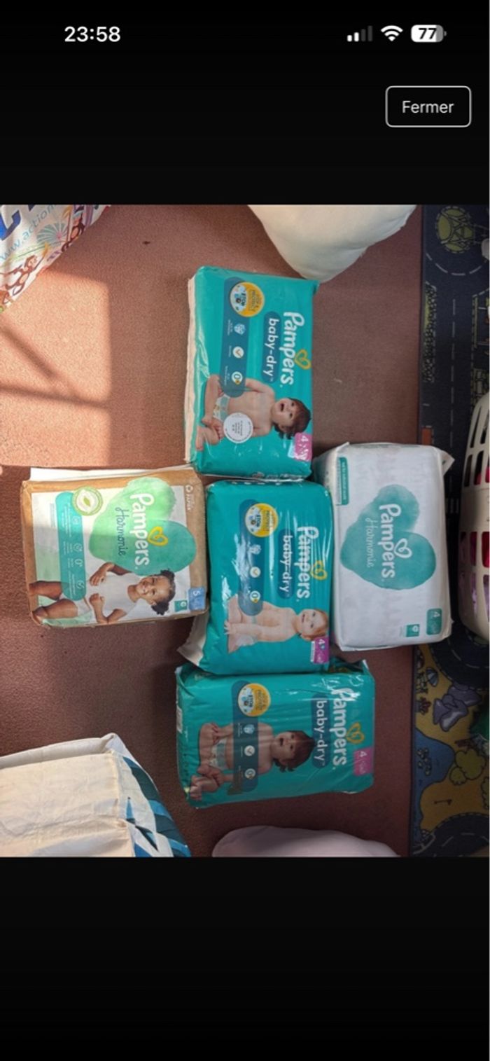 5 paquets de couches T 4 et 5 Pampers neuve