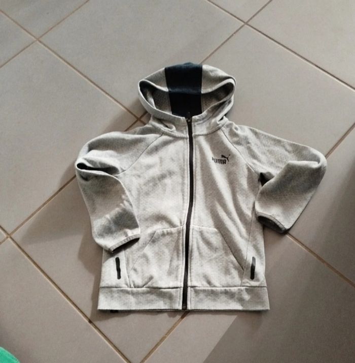 Gilet a capuche
