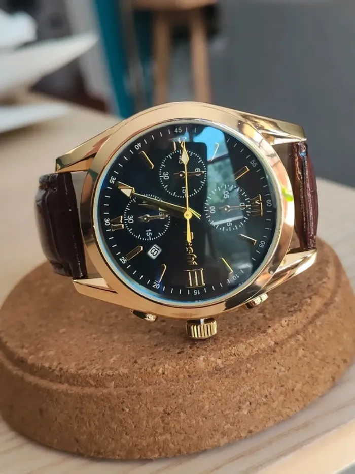 Montre marron, dorée, arrondie à reflets bleus - photo numéro 2