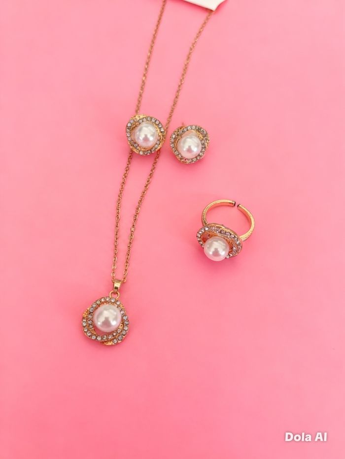 Parure collier boucle d’oreille bague