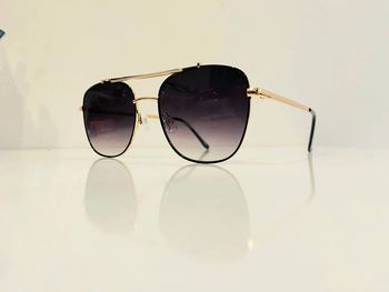 Lunette de soleil mixte noire et dorée verres dégradés UV protection catégorie 3