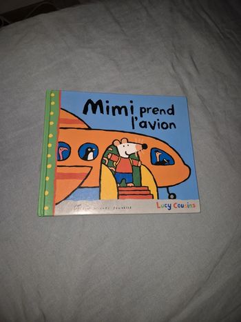 Mimi prend l'avion