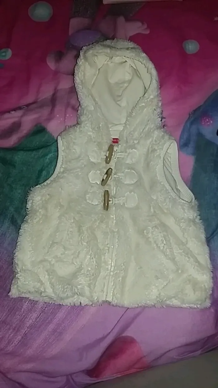 Gilet sans manche avec capuche