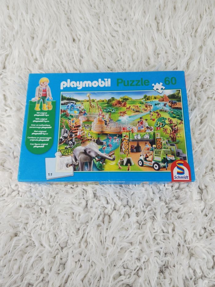 Puzzle 60 pièces avec sa figurine et accessoires Playmobil marque Schmidt - photo numéro 1