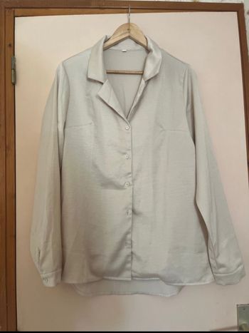 Blouse unicolore à bouton