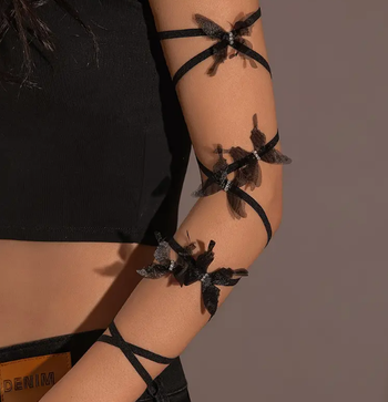 Bijou de bras tendance bracelet ** Neuf ** papillon noir taille unique