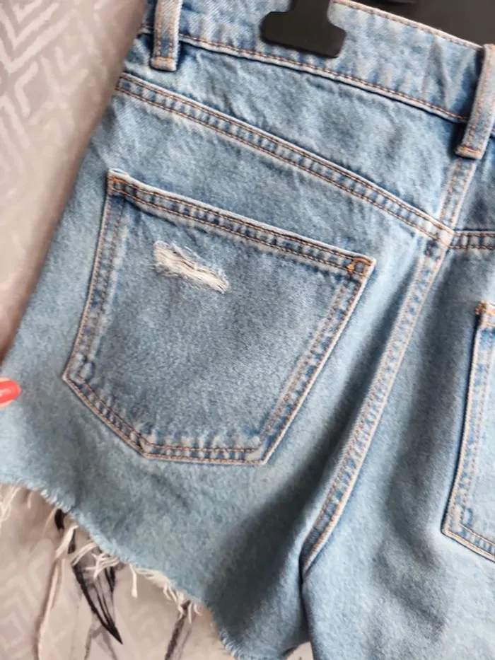 Short en jean destroy - photo numéro 4