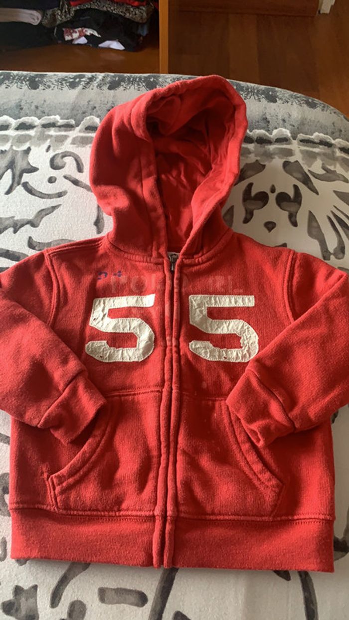 Gilet zippé à capuche