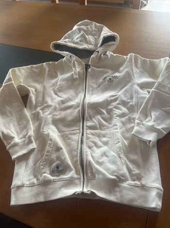 Gilet crème à capuche