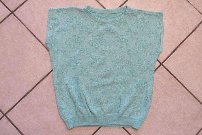 Joli pull sans manche Taille 40 neuf