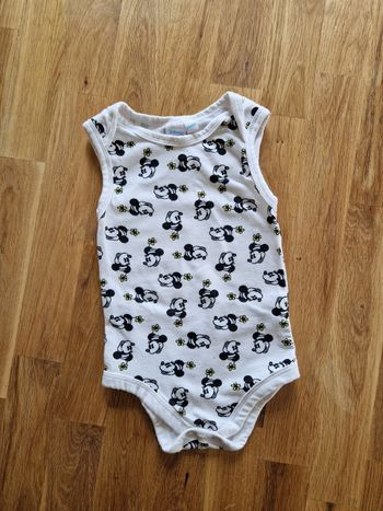 Bodie en très bon état taille 12mois