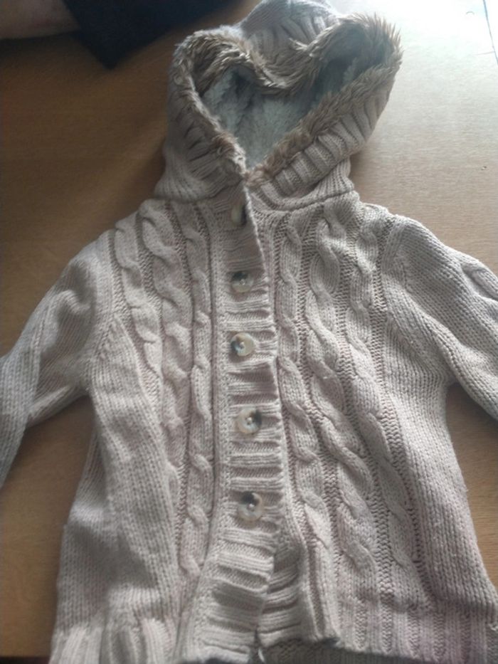 Gilet à capuche avec boutons