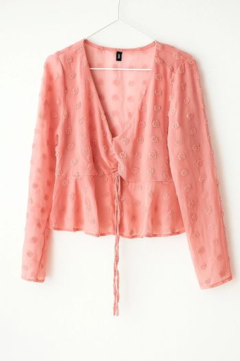 Haut rose pâle