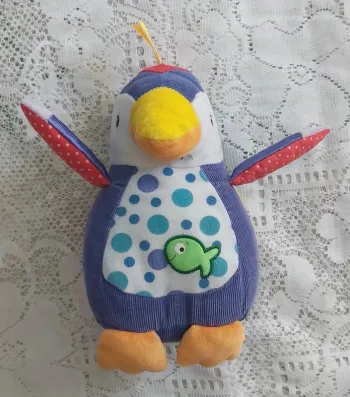 Adorable Peluche pinguoin sensorielle - idéale pour bébé, en très bon état