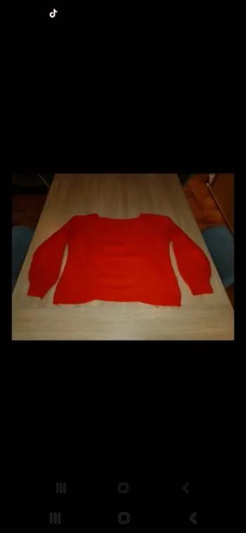 Pull rouge orangé