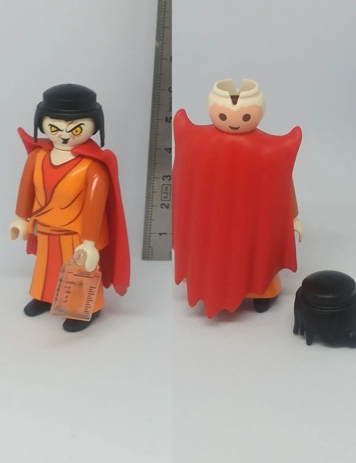 Une Femme sorcière orange avec 2 visages playmobil