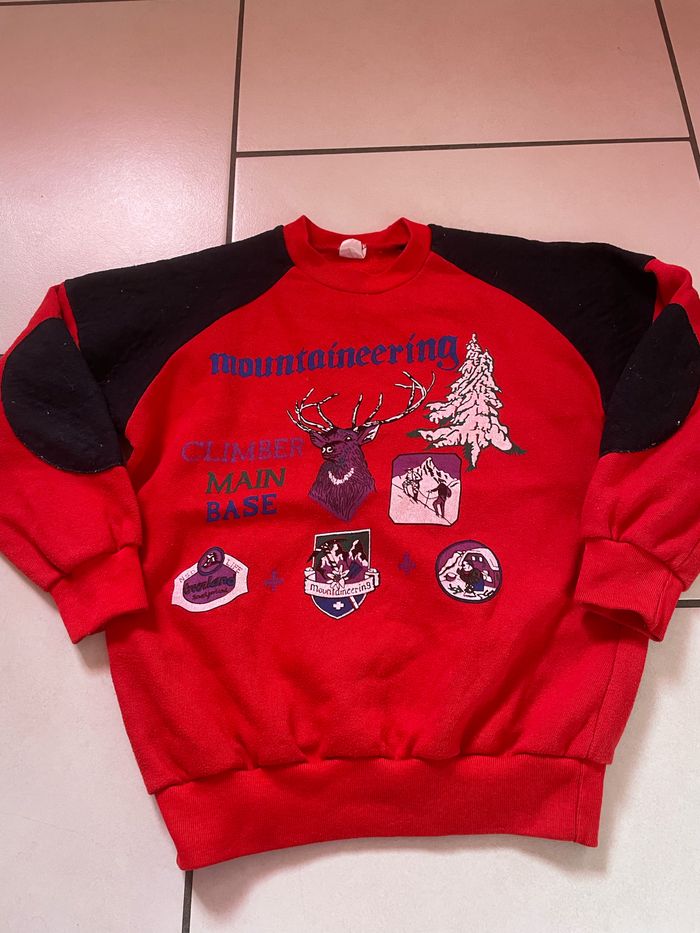 Pull rouge vintage