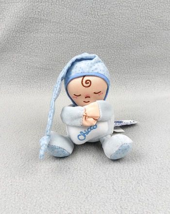 Petit doudou bébé qui dort CHICCO bonnet bleu coussin blanc étoiles 12 cm sos doudou