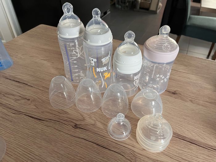 Lot de 5 biberons Nuk + tétines rechange - photo numéro 2
