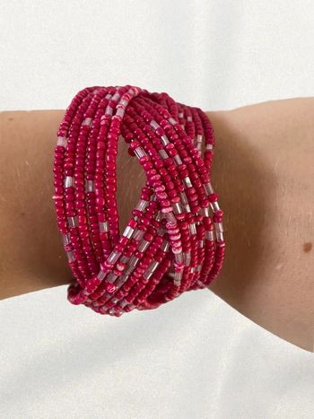 Bracelet rigide perles rose très bon état