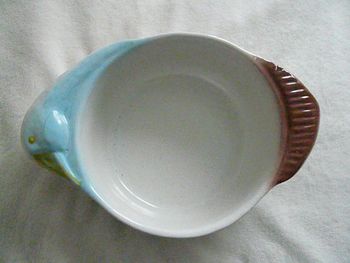 Saladier à tête d’oie en faïence