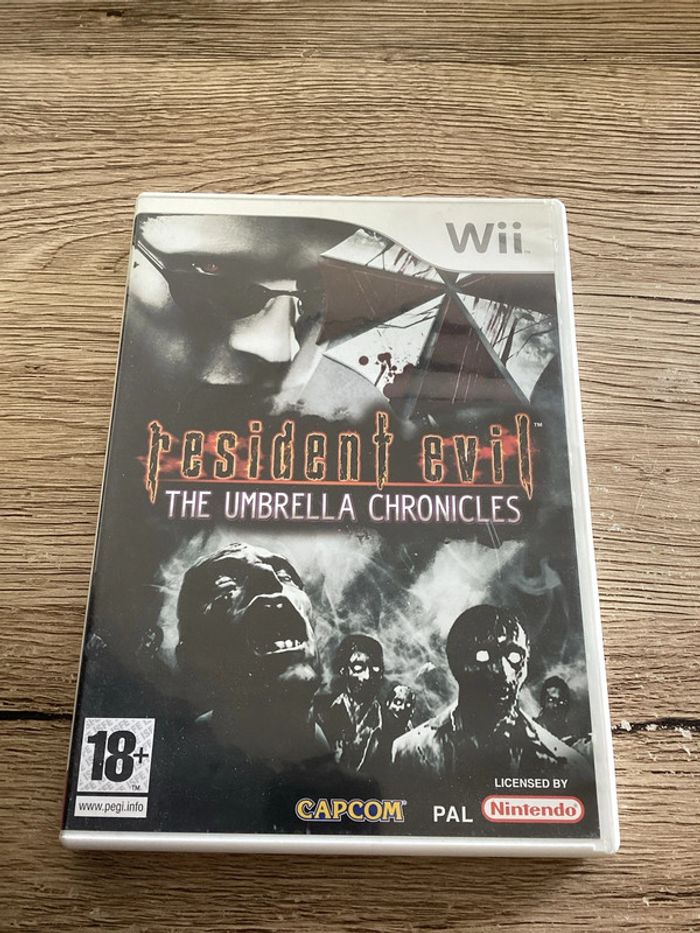 boîte Nintendo wii avec notice resident evil the umbrella chronicles Nintendo wii vendu sans le jeu