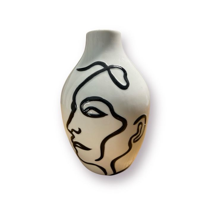 Petit vase blanc motif visage
