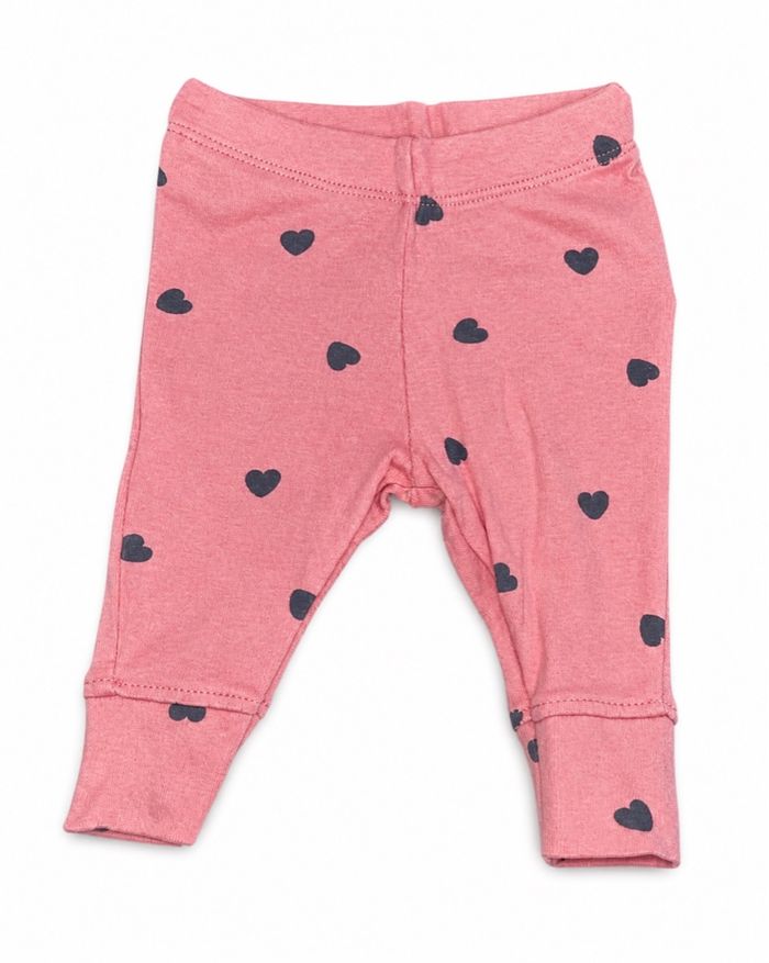 Legging bébé rose à motifs cœurs
