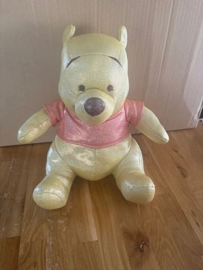 peluche sonore disney 100 ans winnie l'ourson