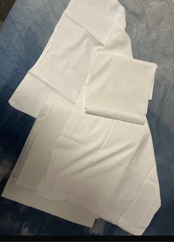 1 draps blanc 100% coton neuf avec 2 housses d’oreiller